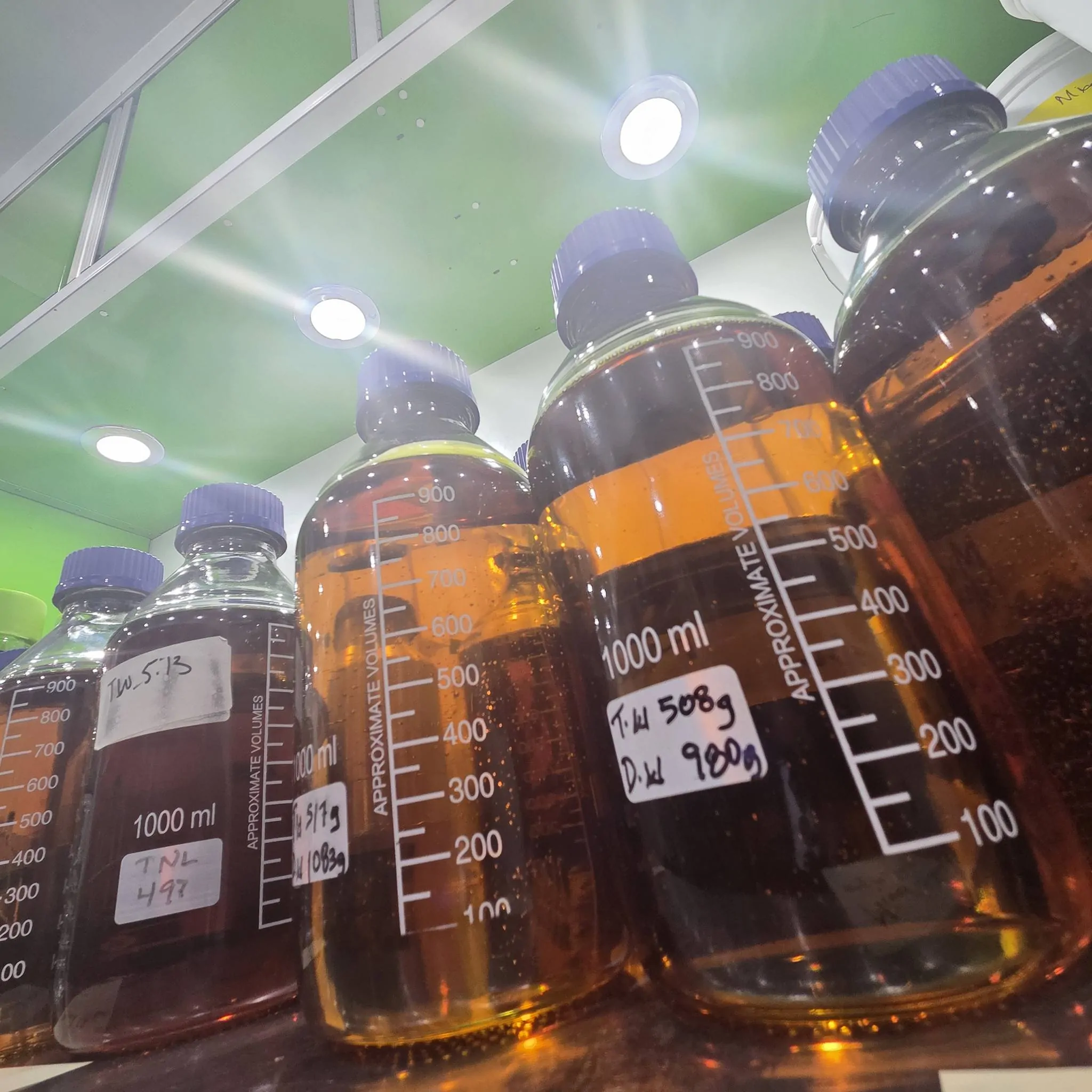 Liter bottles of cannabis extract in production